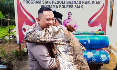 Cooling System Pemilu,Kapolres Siak Salurkan Zakat Personil Wujudkan Rumah Layak Huni Untuk Masyarakat